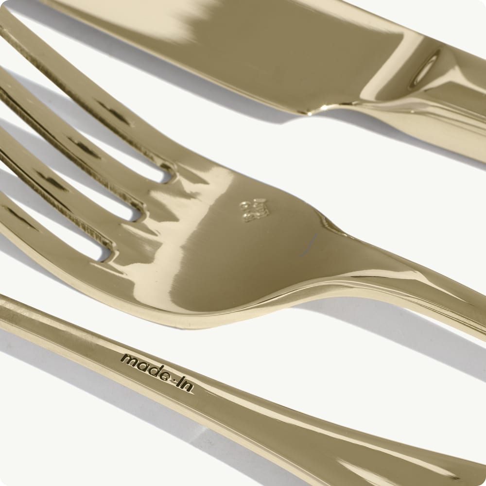Close-up of Champagne-finish fork and knife