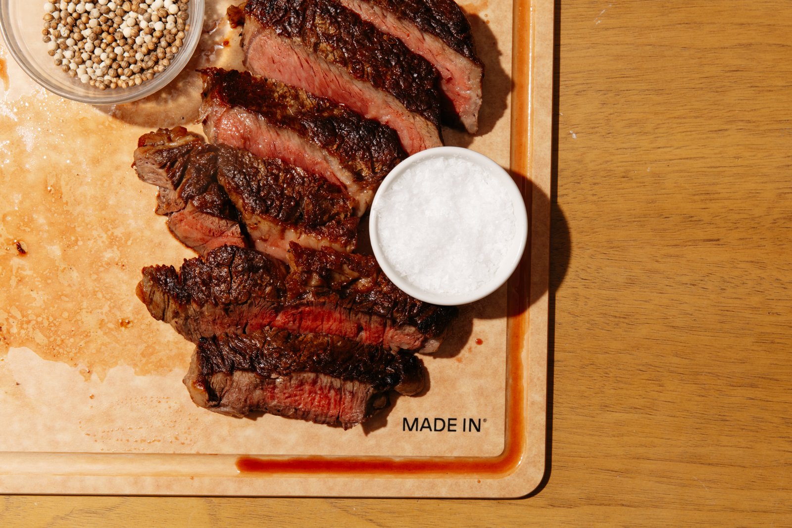 Sliced steak on the Wood Fiber Cutting Board