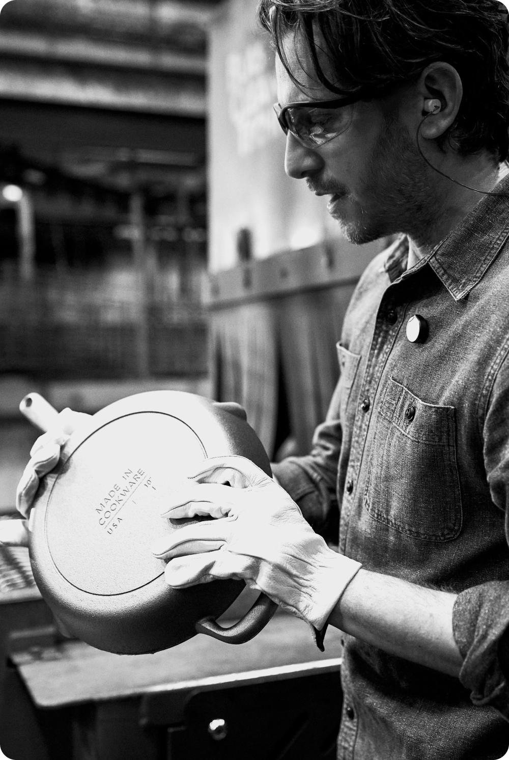 Made In Cookware Co-Founder Jake Kalick inspecting cast iron at the factory