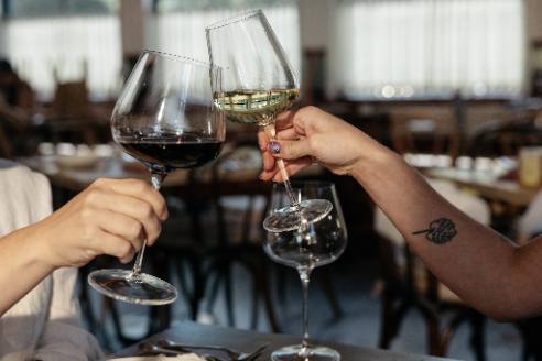Toasting with Made In Crystal Red and White Wine Glasses