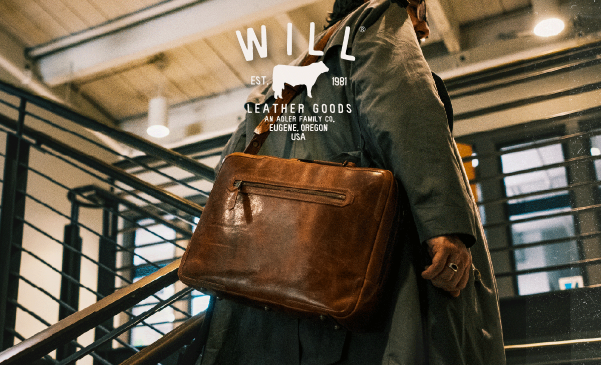 William Collection leather work bag carried in a historic industrial setting