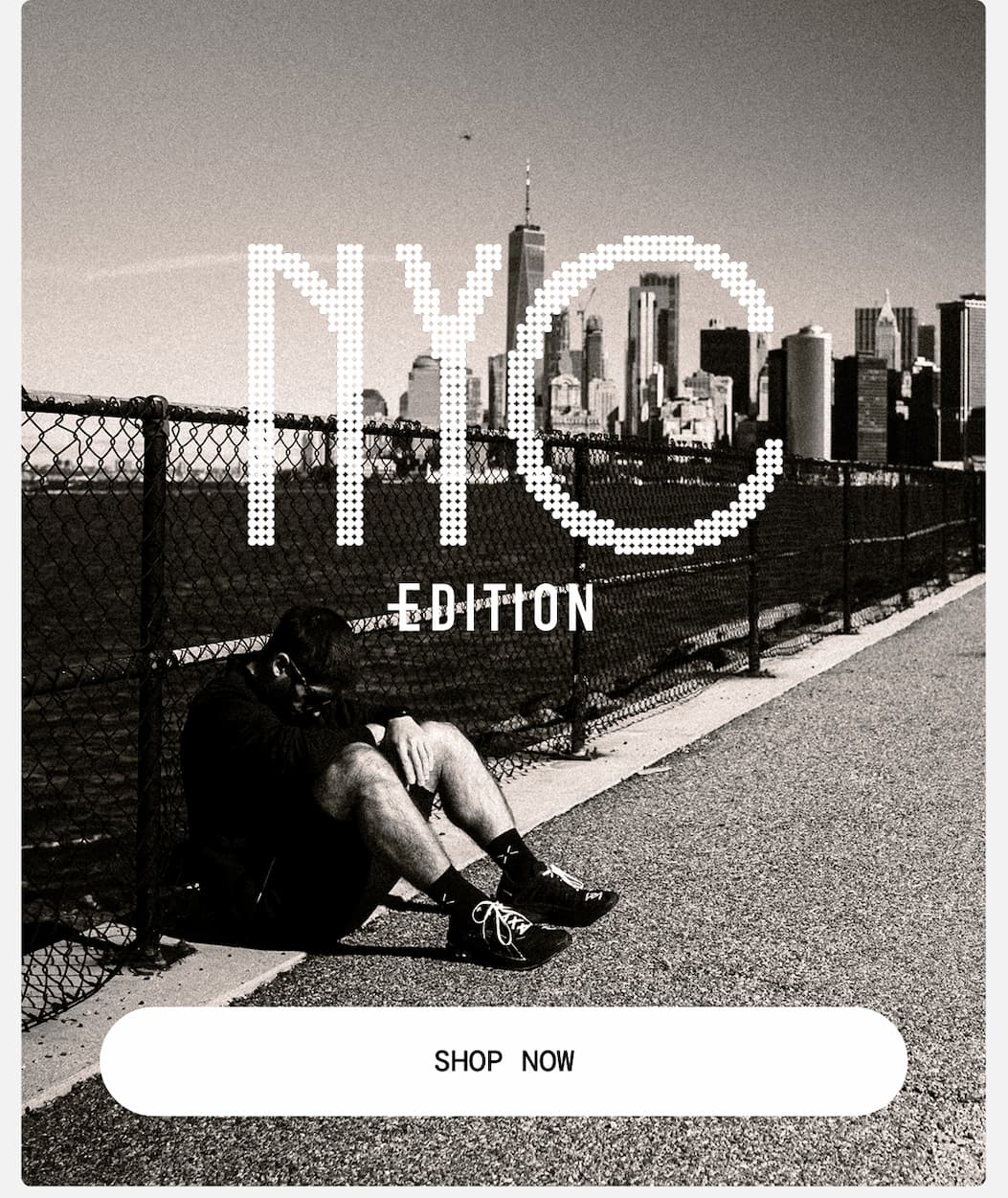 Hero Image: Model in Black and White Wearing New NYC Edition Core Tee