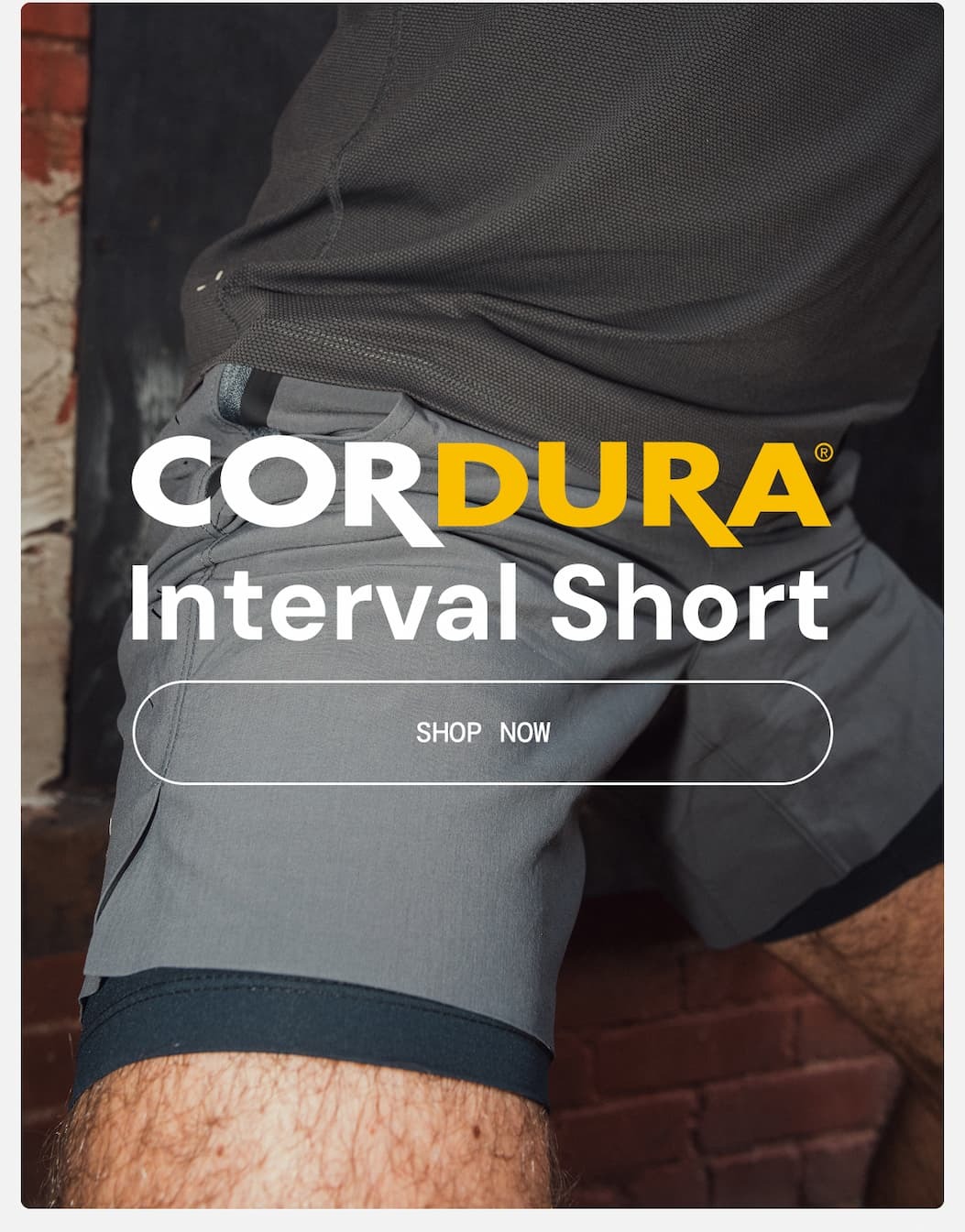 Hero Image: Model Showcasing NEW Curdura Interval Short in Asphalt Gray