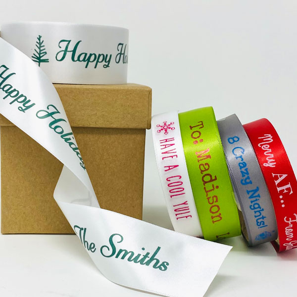 Spool of colorful custom printed holiday ribbon