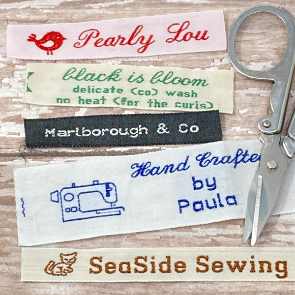 Personalized cotton woven labels with handwritten style messages