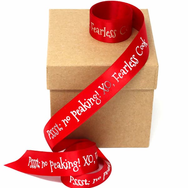 Spool of colorful custom printed holiday ribbon