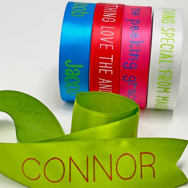 Spool of colorful custom printed holiday ribbon