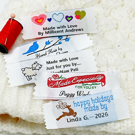 Personalized satin labels with humorous handmade sayings sewn into fabric