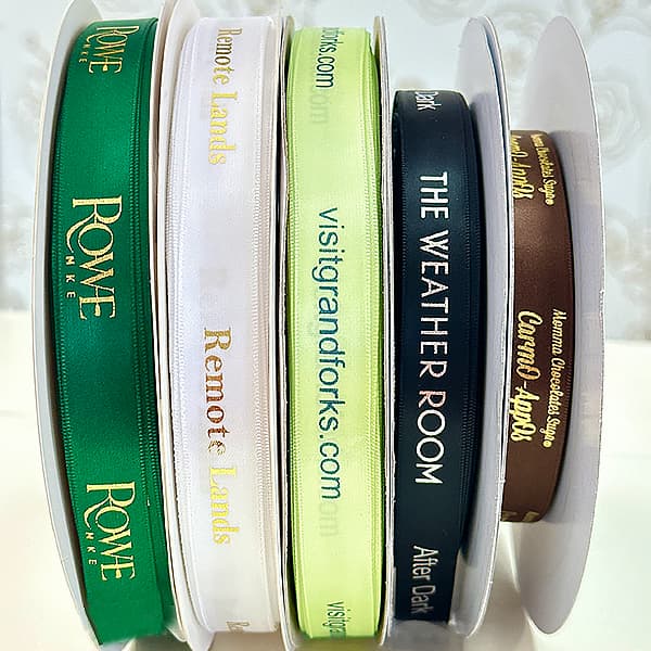 Custom woven ribbons featuring brand and company logos