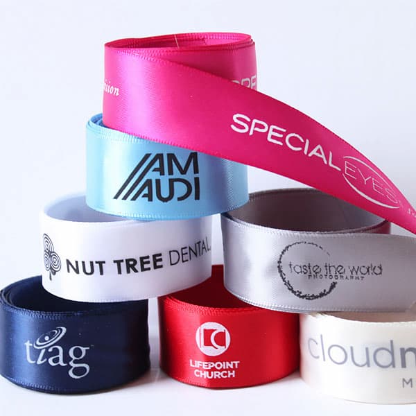 Custom woven ribbons featuring brand and company logos