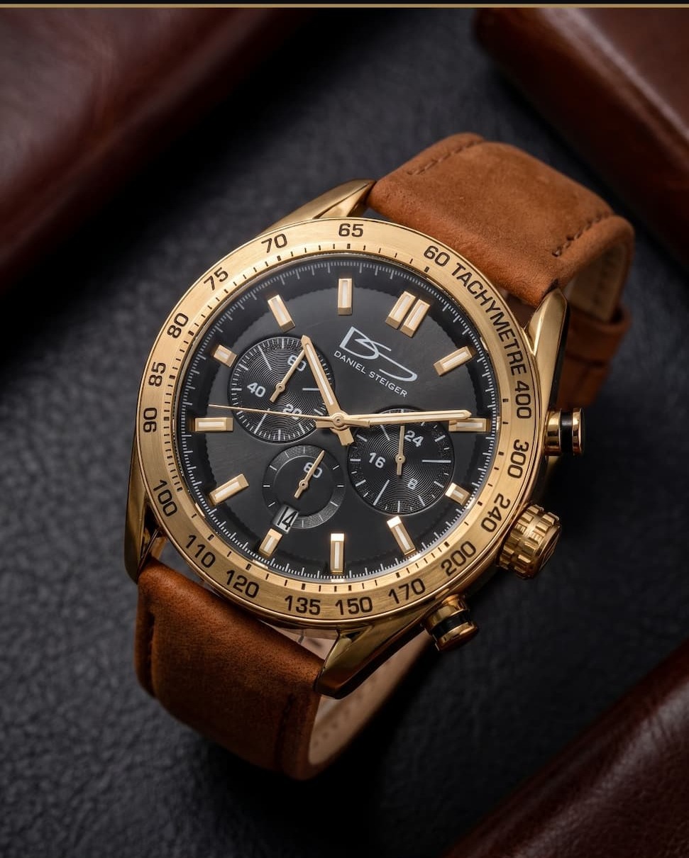 LIGHTWEIGHT ALLOY SPORTS CASE DESERT BROWN NUBUCK LEATHER BAND CASE DEPTH 12MM    CASE WIDTH 43MMHIGH PRECISION CHRONOGRAPH MOVEMENT    TACHYMETER BEZEL     24HR AND DATE 3ATM WATER RESISTANCE