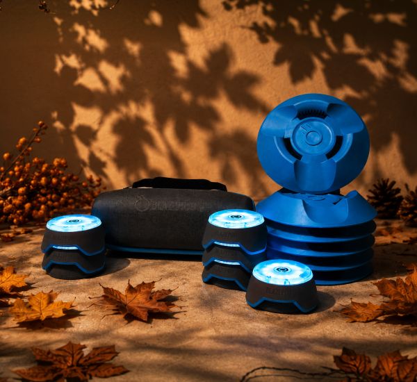 BlazePod Trainer Bundle: 6 Pods with PodBases, case and charging base on a fall-leaf backdrop