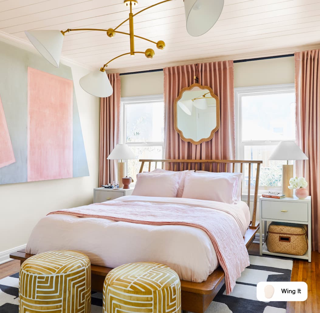 Bedroom featuring painted ceiling in barely there pink paint color Wing It