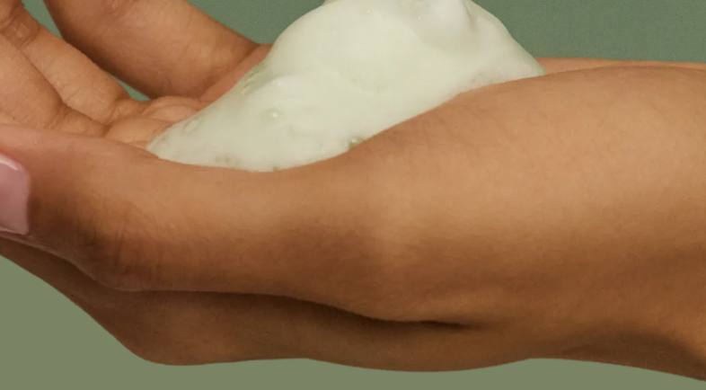 An image of a hand showing the Matcha Foam Cleanse's texture