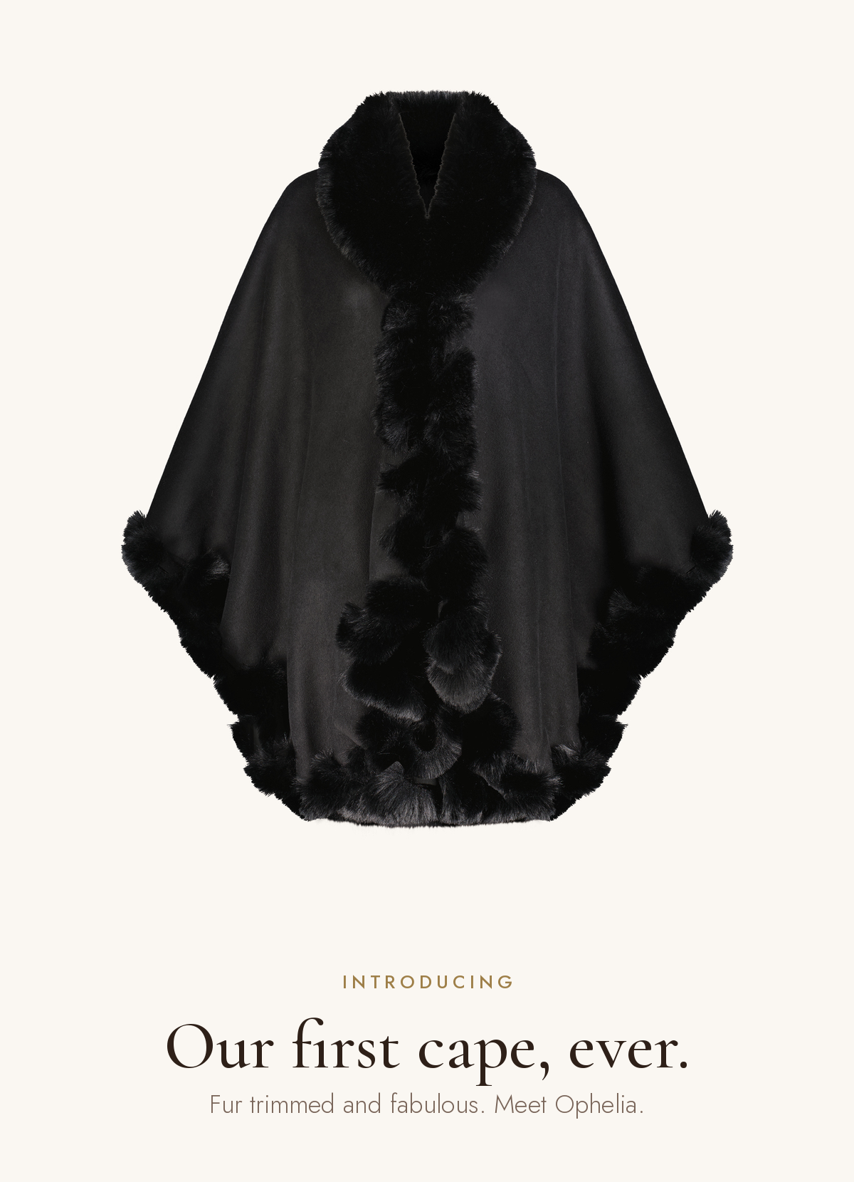 Introducing our first cape ever: the Ophelia Fur Trim Cape in Black, a black cape framed in plush faux fur, The Noli Shop