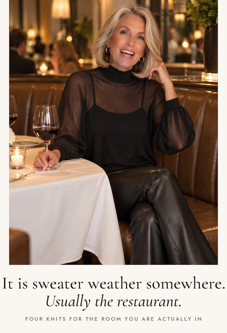Woman laughing at a restaurant banquette in the Donna Two Piece Sweater in Black with the Daphne Leather Pant