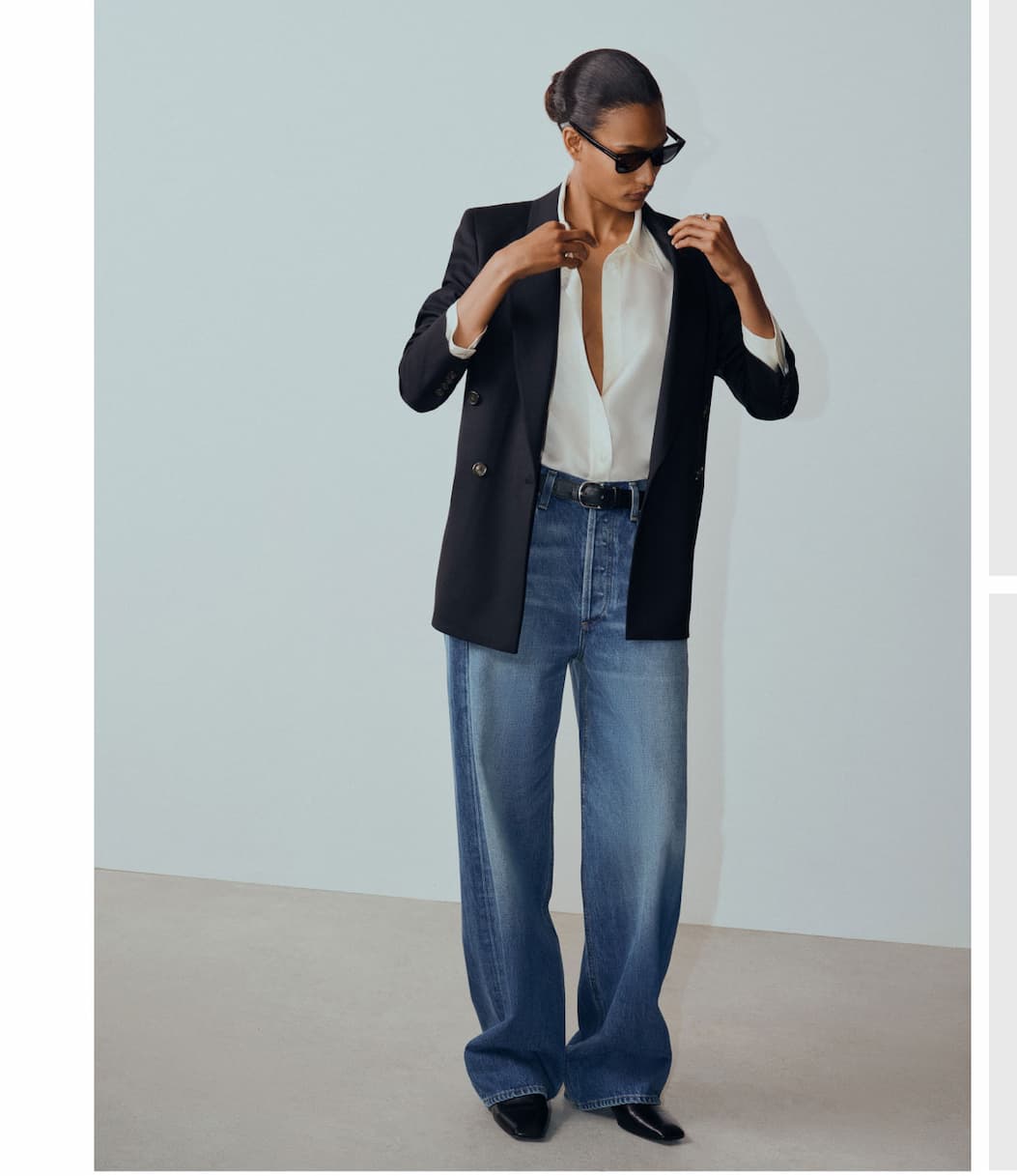 A sharp black blazer meets relaxed denim for an easy high-low pairing that feels equally suited to the everyday and beyond. A sharp black blazer meets relaxed denim for an easy high-low pairing that feels equally suited to the everyday and beyond.