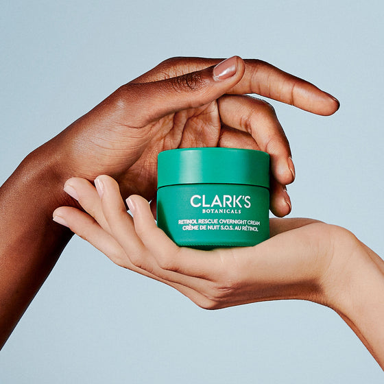 Retinol Rescue Overnight Cream held in two hands