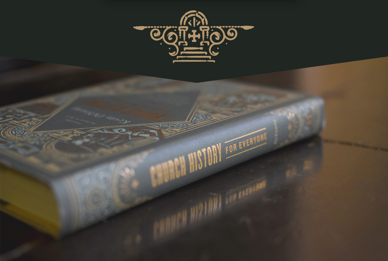 Church History for Everyone hardcover resting on a dark wood table