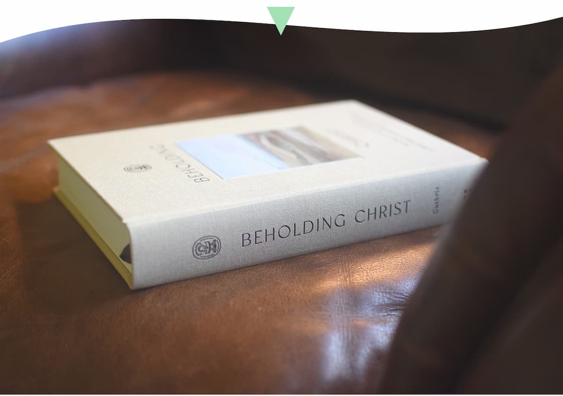 Nancy Guthrie Provides 365 Daily Bible Reading Introductions That Equip Readers to Understand Each Day's Passage and What It Uniquely Reveals About Christ  Each book of the Bible is a chance to encounter Jesus, and every day of the year is an opportunity to seek him more deeply. In Beholding Christ, Bible teacher and bestselling author Nancy Guthrie offers 365 daily Bible reading introductions that provide background, context, and perspective to guide the reader into greater understanding of each day's text as well as insight on how the passage uniquely reveals the person and work of Christ.  Drawing upon Guthrie's years of experience as a Bible teacher and her passion for seeing Christ in all the scriptures, each day's reading begins with a statement about Christ that arises from the text, though it may not be immediately on the surface. In the reading introduction, she explains unfamiliar characters, events, and cultural realities; draws out biblical-theological themes; and emphasizes how the chapters fit into the bigger story of redemptive history. She then lists key words and ideas to look for as you read, as well as encouragement in how to respond in prayer, personal examination, meditation, and worship.  While Beholding Christ: A Daily Guide to Seeing Jesus in All of Scripture is designed to be a companion to whatever Bible you use, the ESV Beholding Christ Bible, which includes these instructive readings interspersed within the full ESV text, is also available. Beholding Christ will help you persevere in reading through the Bible in its entirety with a better understanding of what you're reading and with a greater focus on how it reveals the beauty, necessity, and sufficiency of Christ.