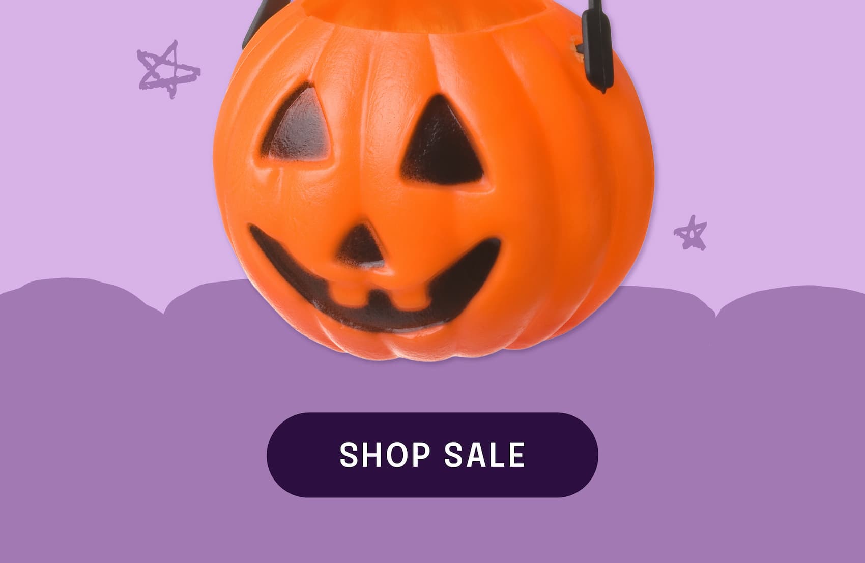 Image: a candy bucket shaped like a jack-o-lantern. Text: shop sale >>