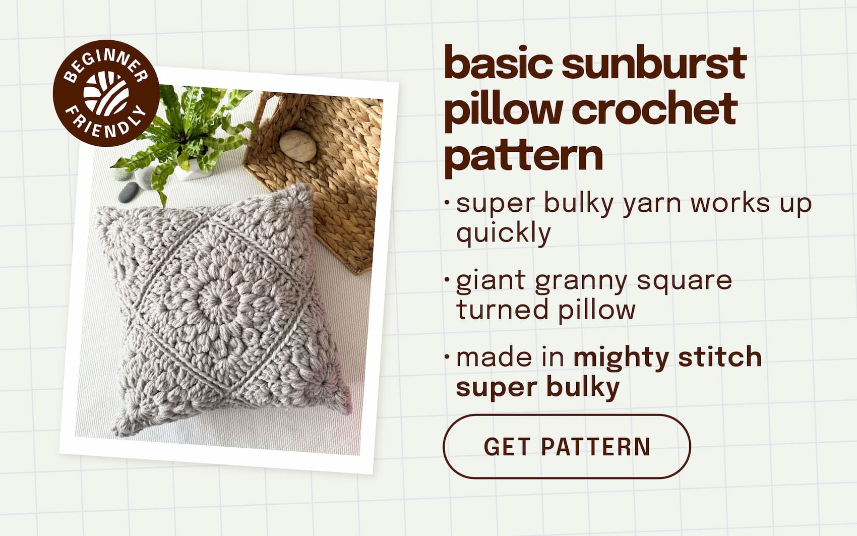 Image: A grey crocheted pillow. Text: basic sunburst pillow crochet pattern. super bulky yarn works up quickly. giant granny square turned pillow. made in mighty stitch super bulky. get pattern >>