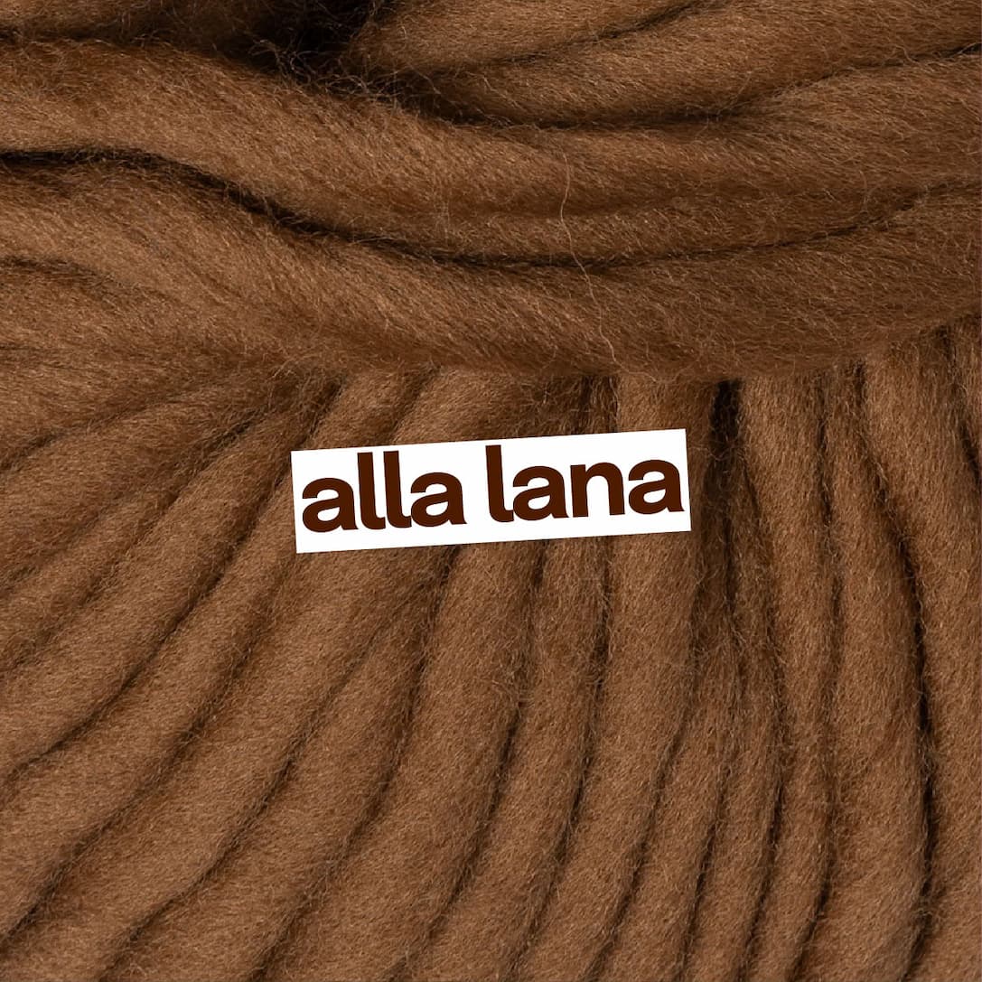 Image: Chocolate brown puffy yarn. Text: alla lana >>