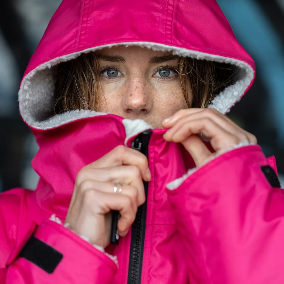 Surfer Lucy Campbell in a Pink Dryrobe® Advance