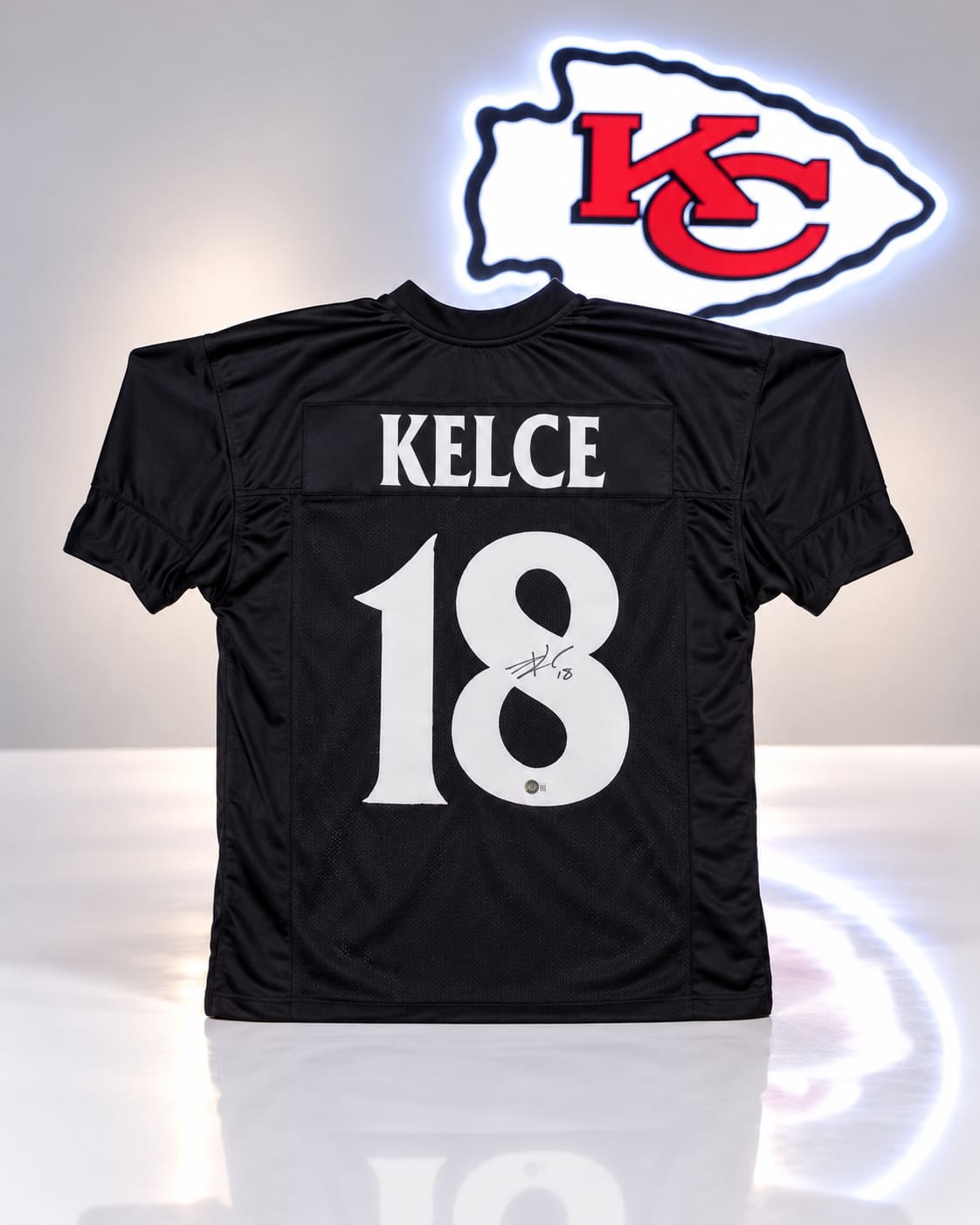 Travis Kelce signed black custom pro-style jersey with KELCE and No. 18 on the back