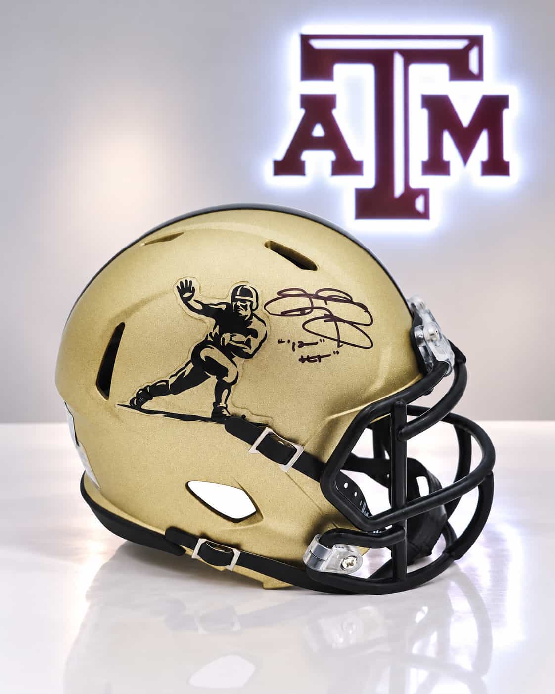 Johnny Manziel signed gold Heisman Speed mini helmet with 12 HT inscription