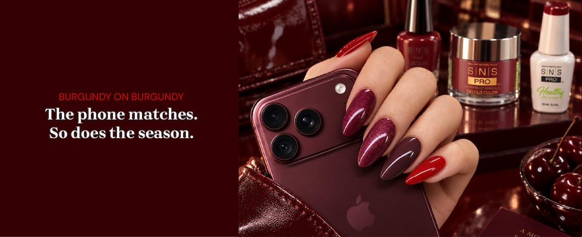 Burgundy on burgundy. The phone matches. So does the season.