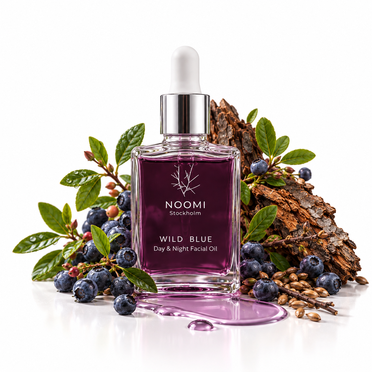 Wild Blue Day and Night Facial Oil surrounded by wild blueberries