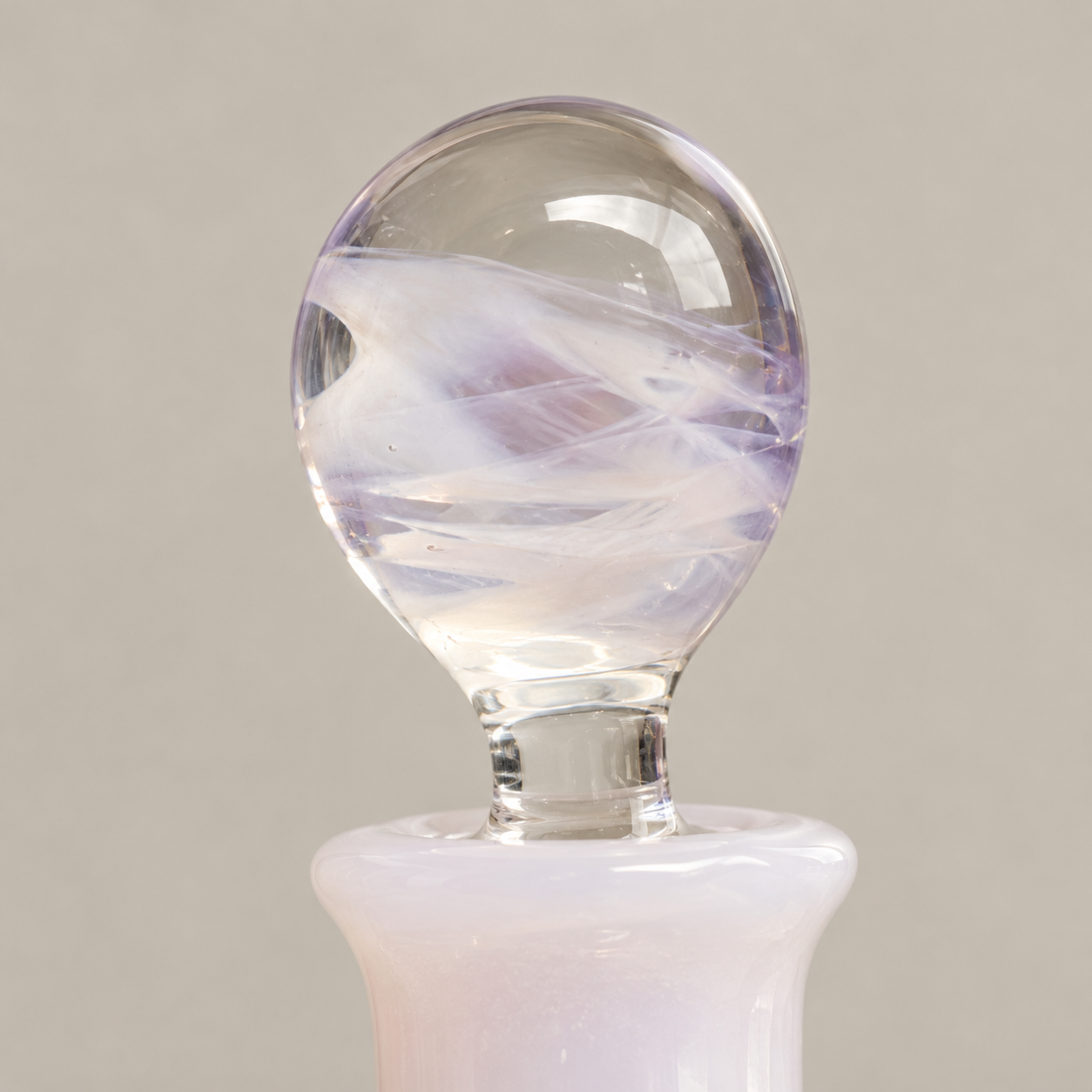 Hand-blown glass stopper with an organic mineral swirl
