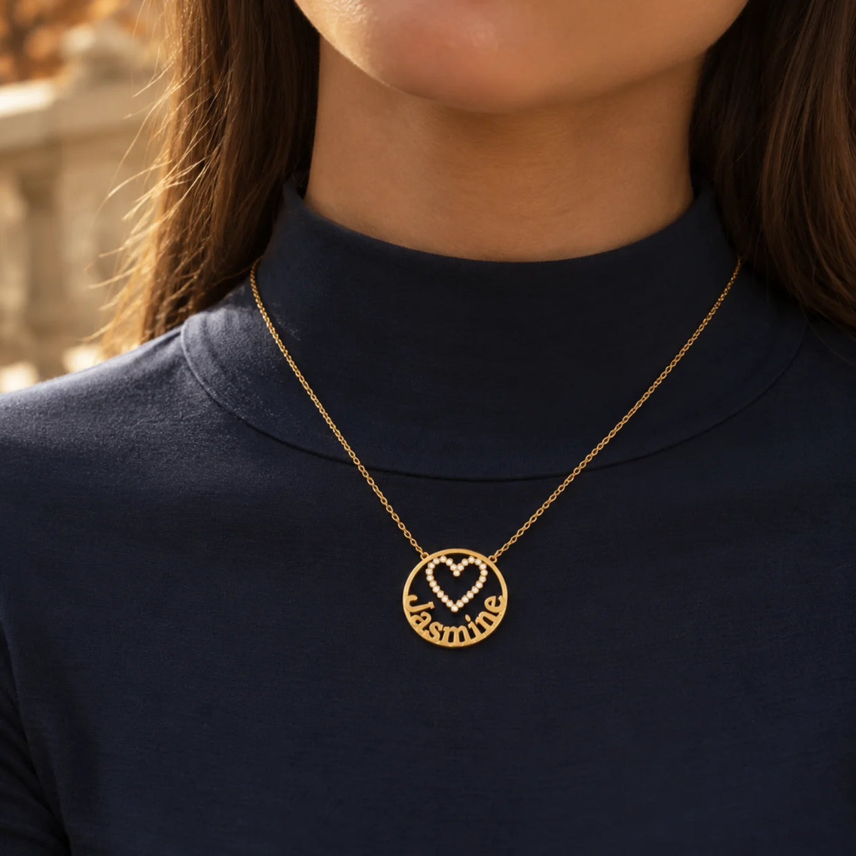 Heart name pendant in solid gold, worn