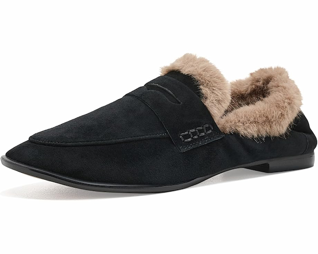 Black suede loafer with soft taupe faux-fur lining, classic penny strap, and low stacked heel. Fearrington Village.