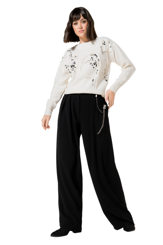 knitted sweater with asymmetric neck and sequins