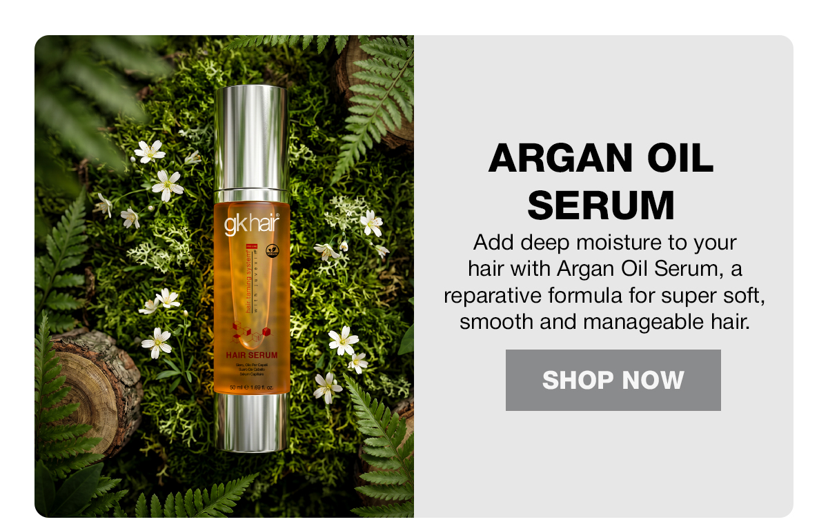 GK Hair Argan Oil Serum bottle on green moss and ferns, with Shop Now button