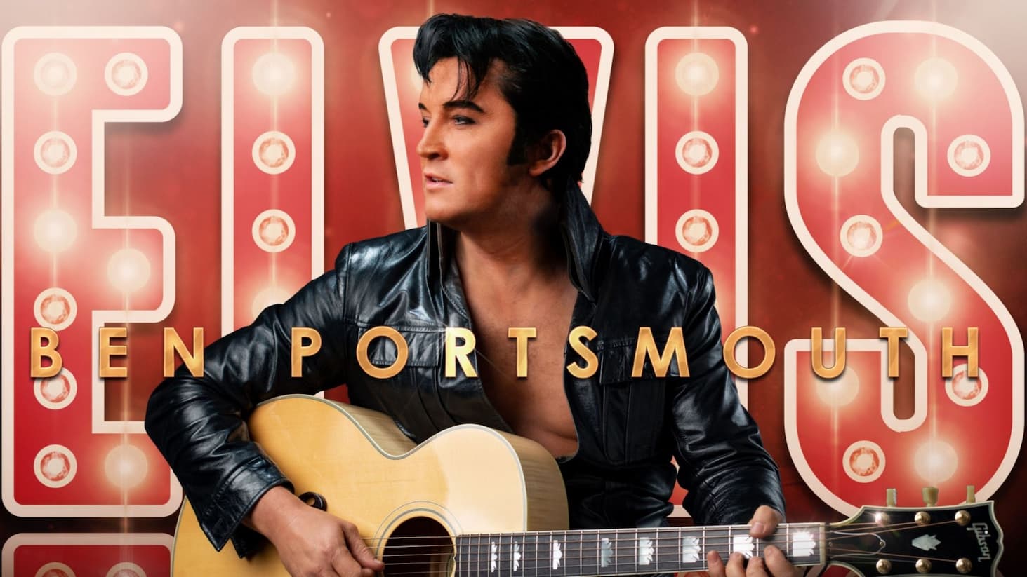 Performer dressed in an Elvis-style black leather outfit plays an acoustic guitar before illuminated “ELVIS” lettering, with “Ben Portsmouth” displayed prominently.