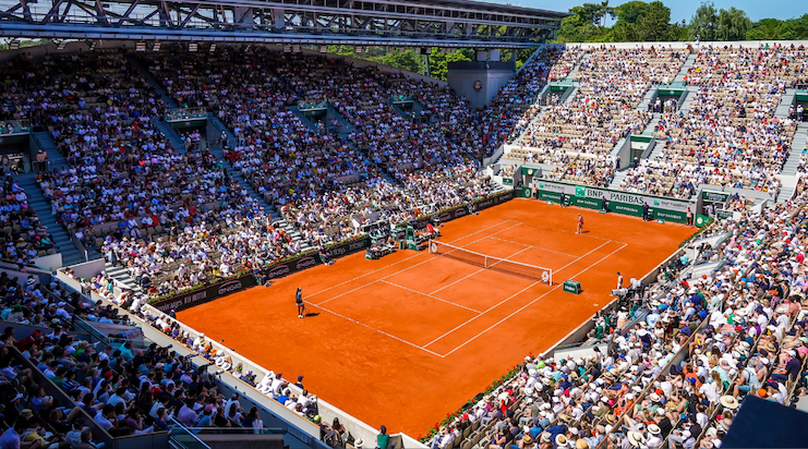 Tennis match on a grass court