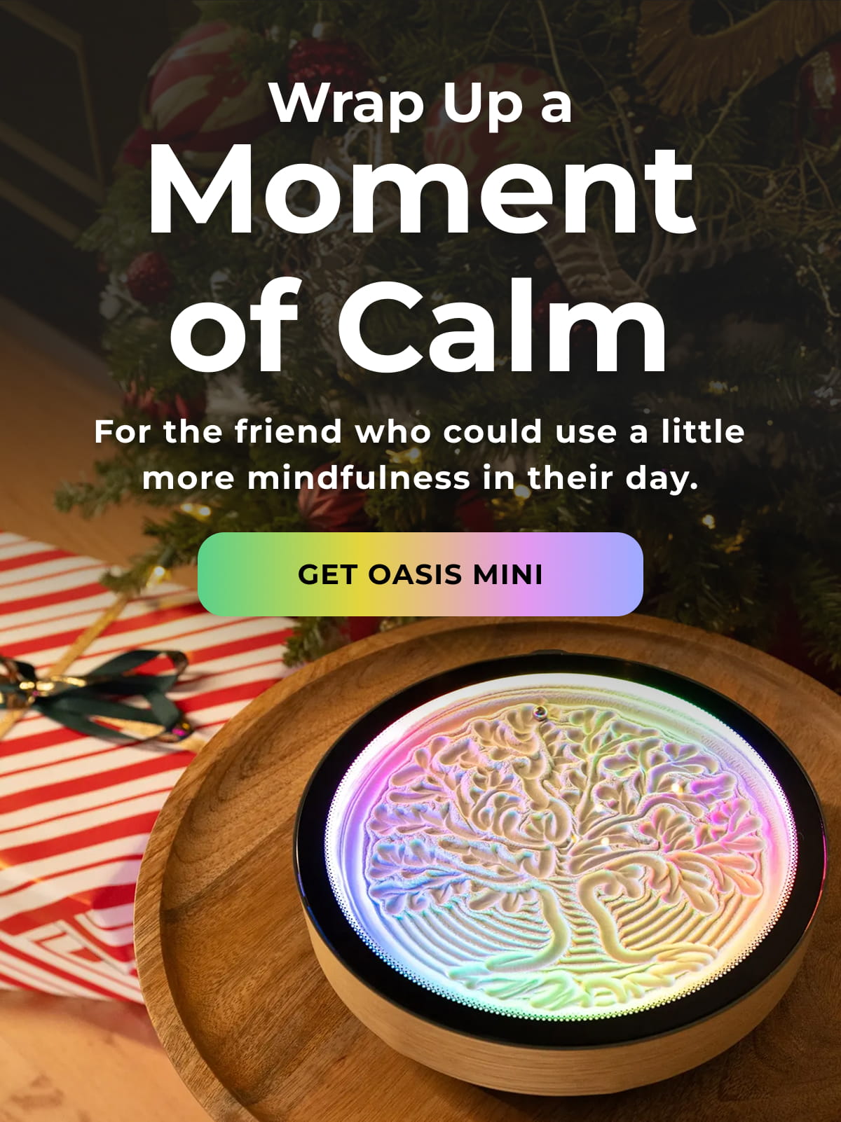 Oasis Mini glowing beside holiday gifts and a Christmas tree.