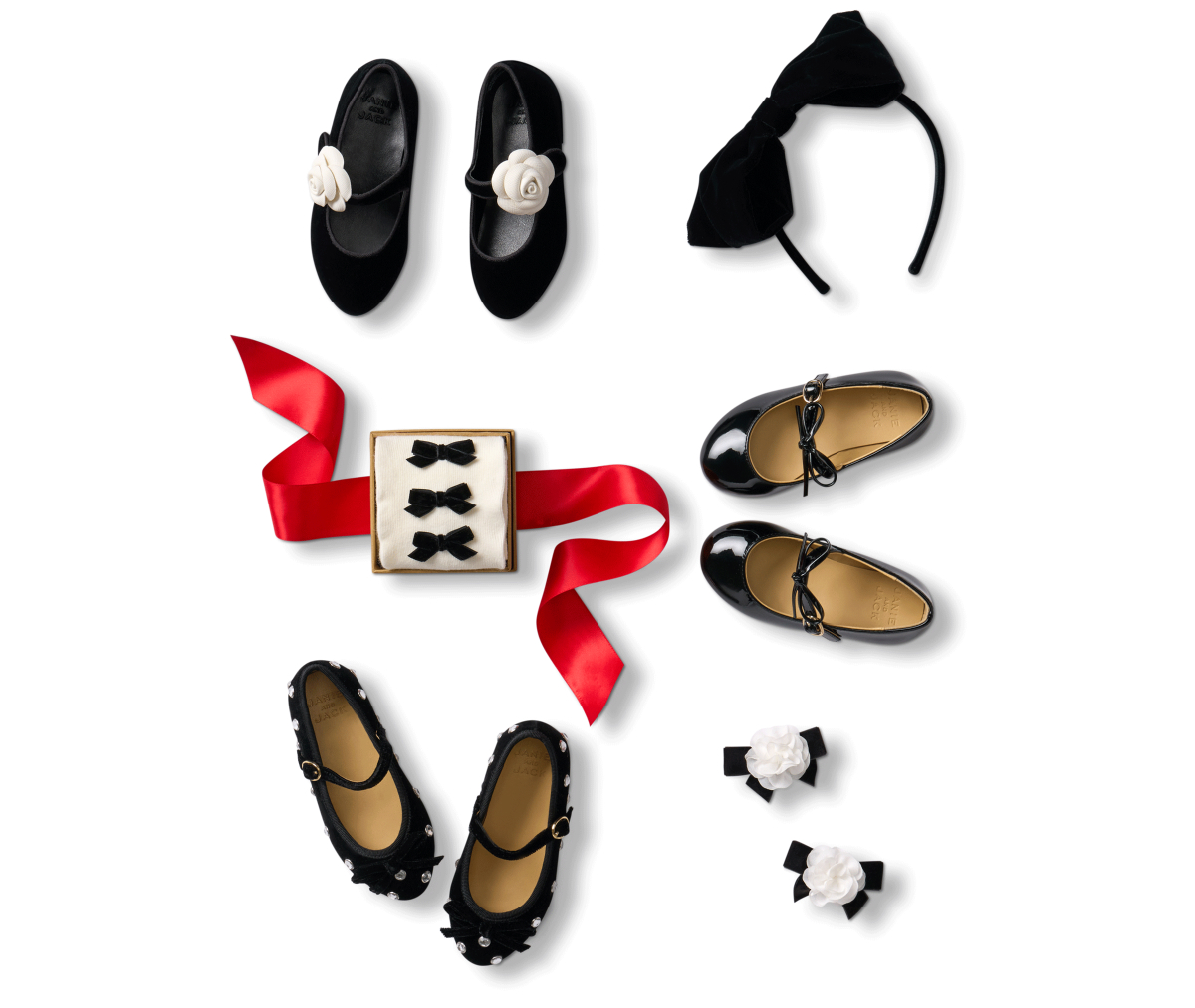 Black Mary Jane shoes, bow headband, hair clips, and mini bow barrette set for girls flat lay