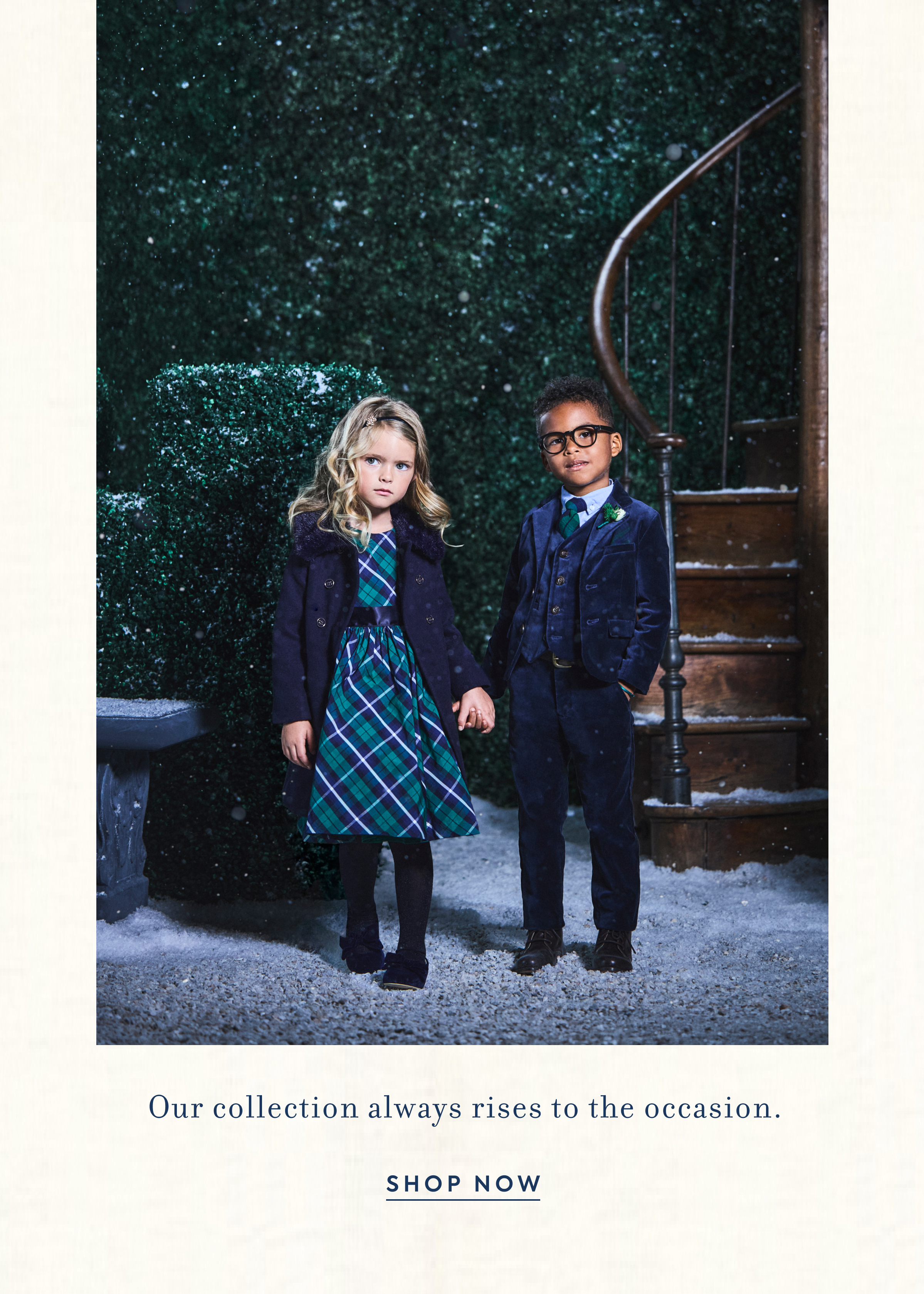 Two dressed-up children standing in snow outside - Our collection always rises to the occasion.