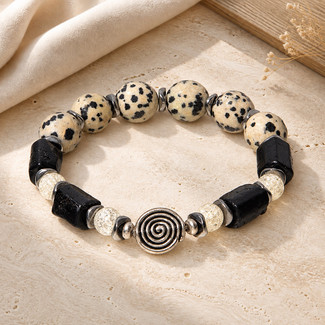 The Laugh Despite It All Bracelet in warm tourmaline tones.