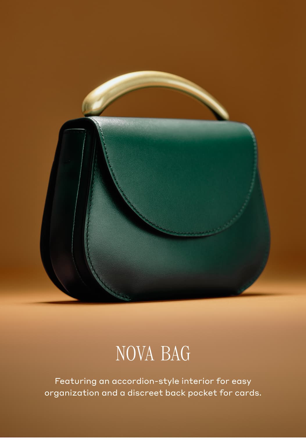 NOVA BAG Featuring an accordian-style interior for easy organization and a discreet back pocket for cards.