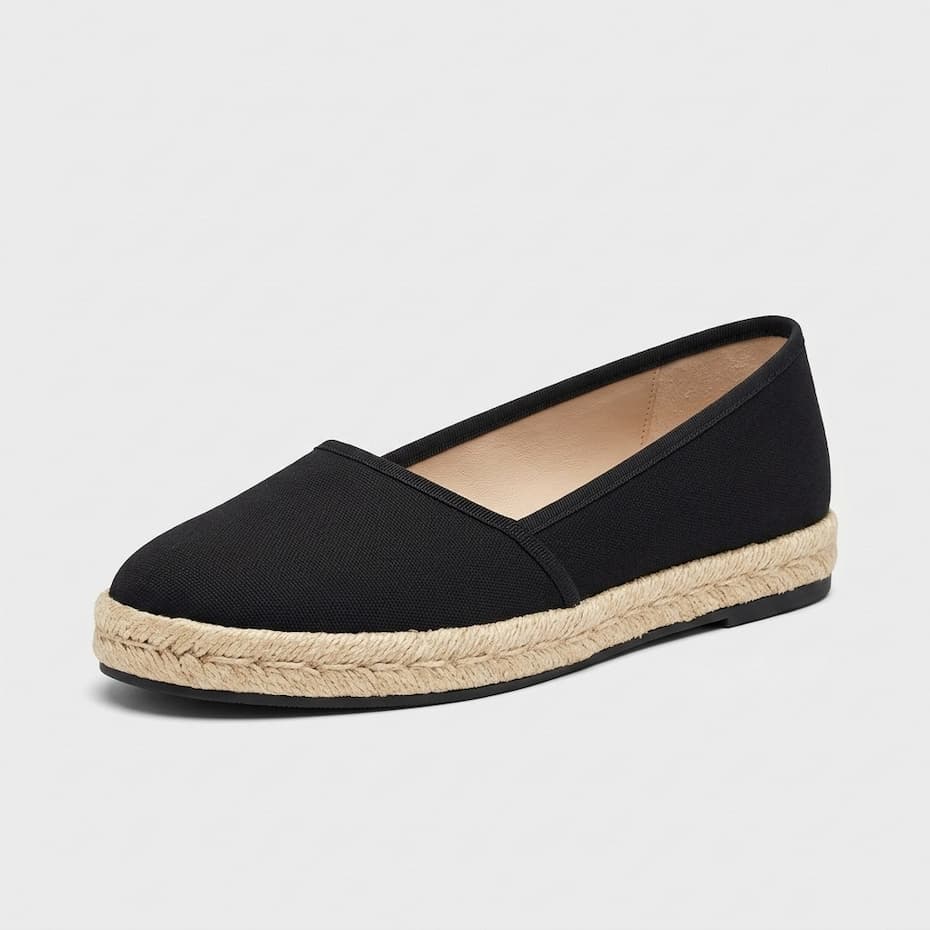 Stuart Weitzman espadrille flat in black canvas at Century 21 NYC