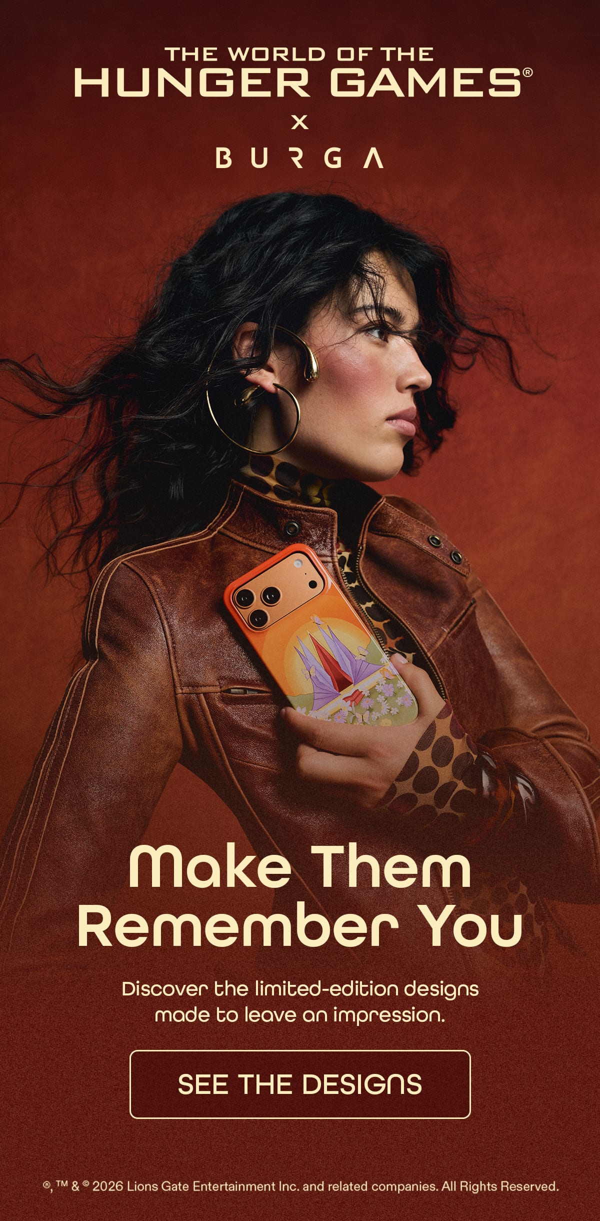 The World of the Hunger Games x Burga advert featuring a woman holding a phone case.