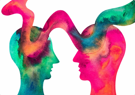 A watercolor illustration of two human heads connected by a ribbon of green and magenta.