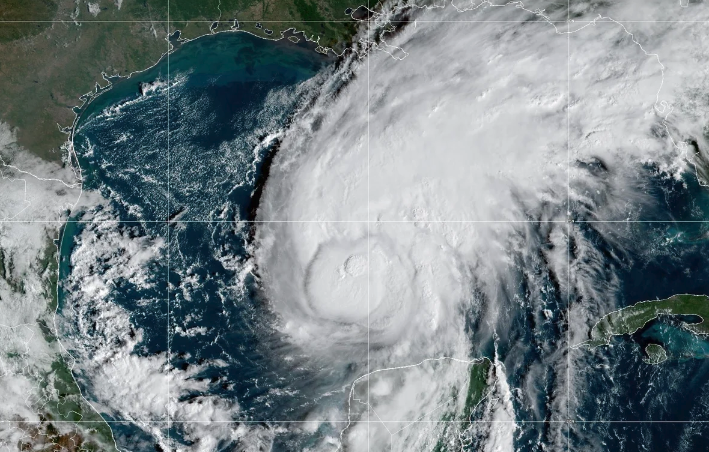 Satellite image of a large hurricane swirling over the Gulf of Mexico near the U.S. Gulf Coast.
