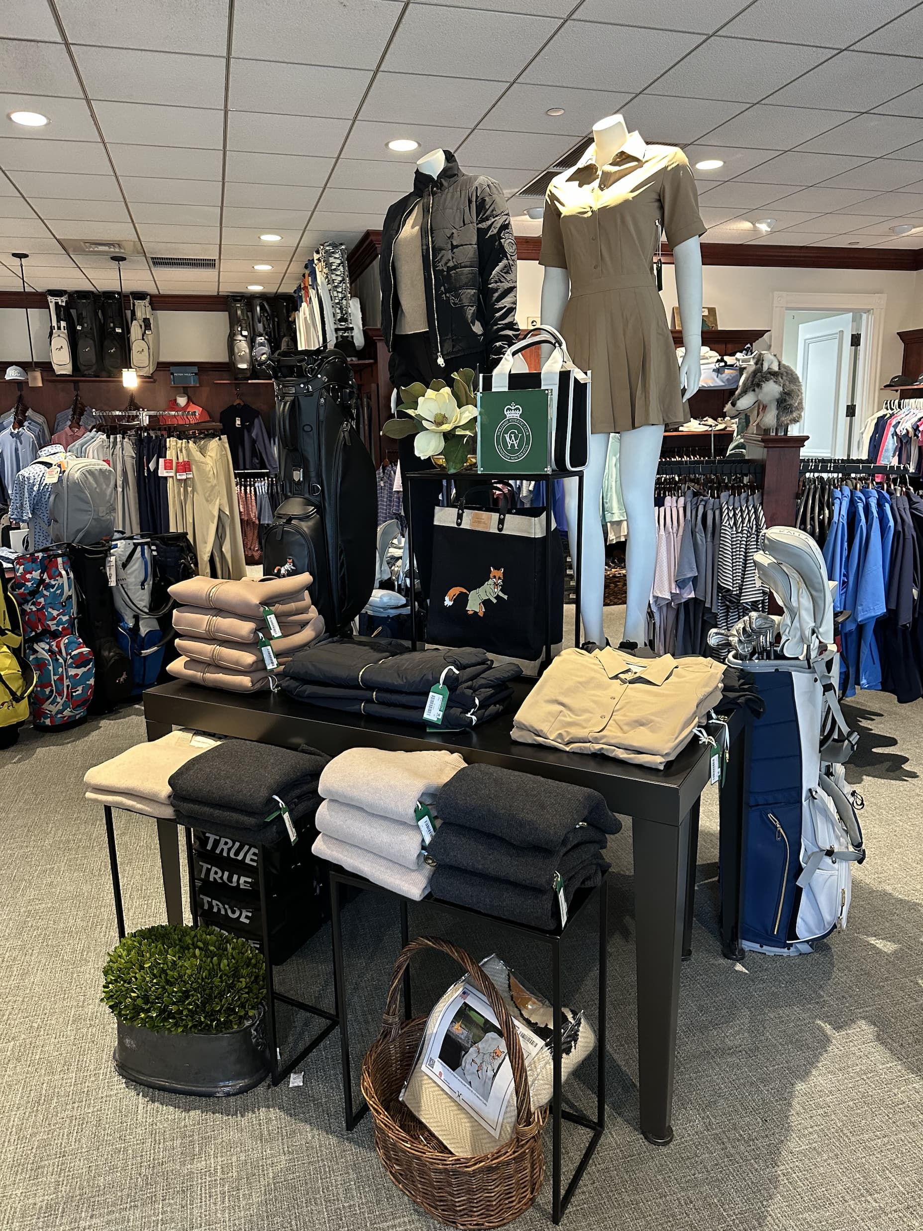 Apparel and accessories on display in the River Bend golf shop