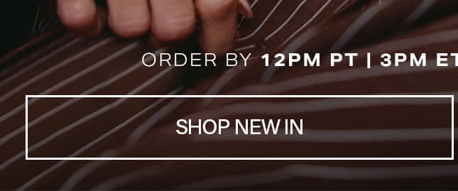 Hand resting on dark brown pinstripe apparel with a Shop New In button and order deadline overlay, promoting new fashion arrivals.